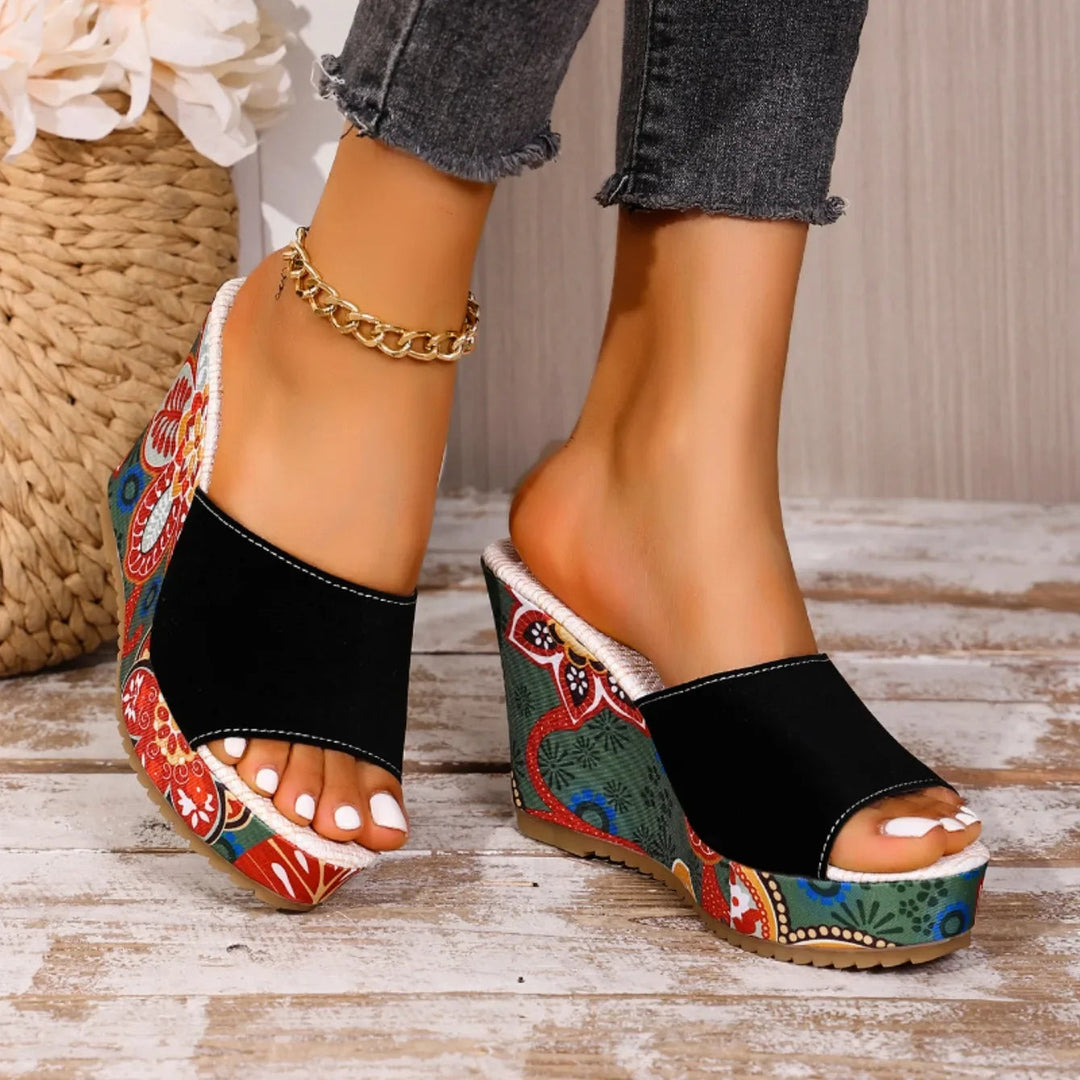 Joelle™ — Sculptural mules with a floral heel