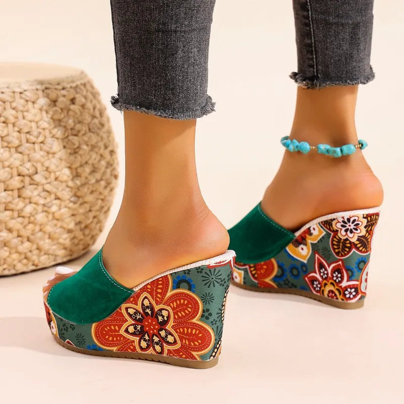 Joelle™ — Sculptural mules with a floral heel