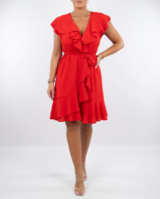 Célyane™ — Feminine flowing black wrap dress